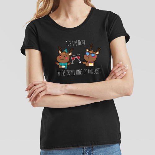 Black Ladies T-Shirt printed with cheerful design of reindeer enjoying a tipple and the text It’s The Most Wine-derful Time of The Year across the chest.